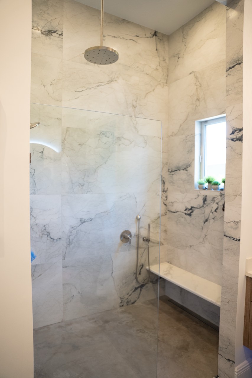 Renovated marble walk-in shower