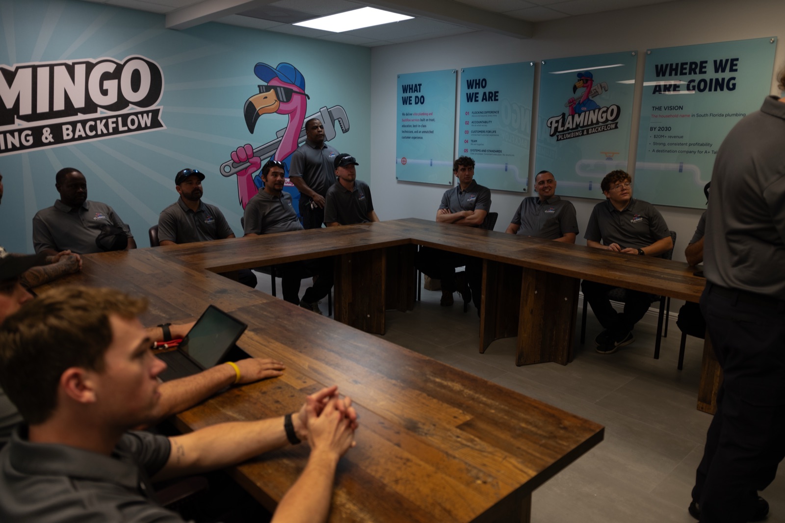 The Flamingo team gathered for a briefing