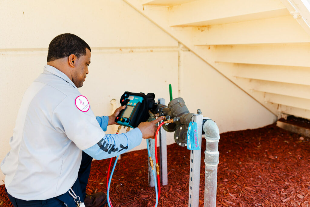 backflow testing by a flamingo plumbing employee