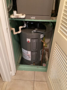 water heater in condominium closet